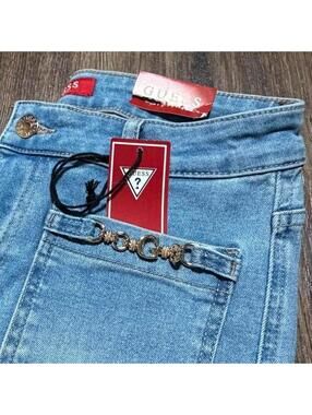 Guess Light Wash mid rise boot cut Jeans | Logo Hardware Pockets | NWT